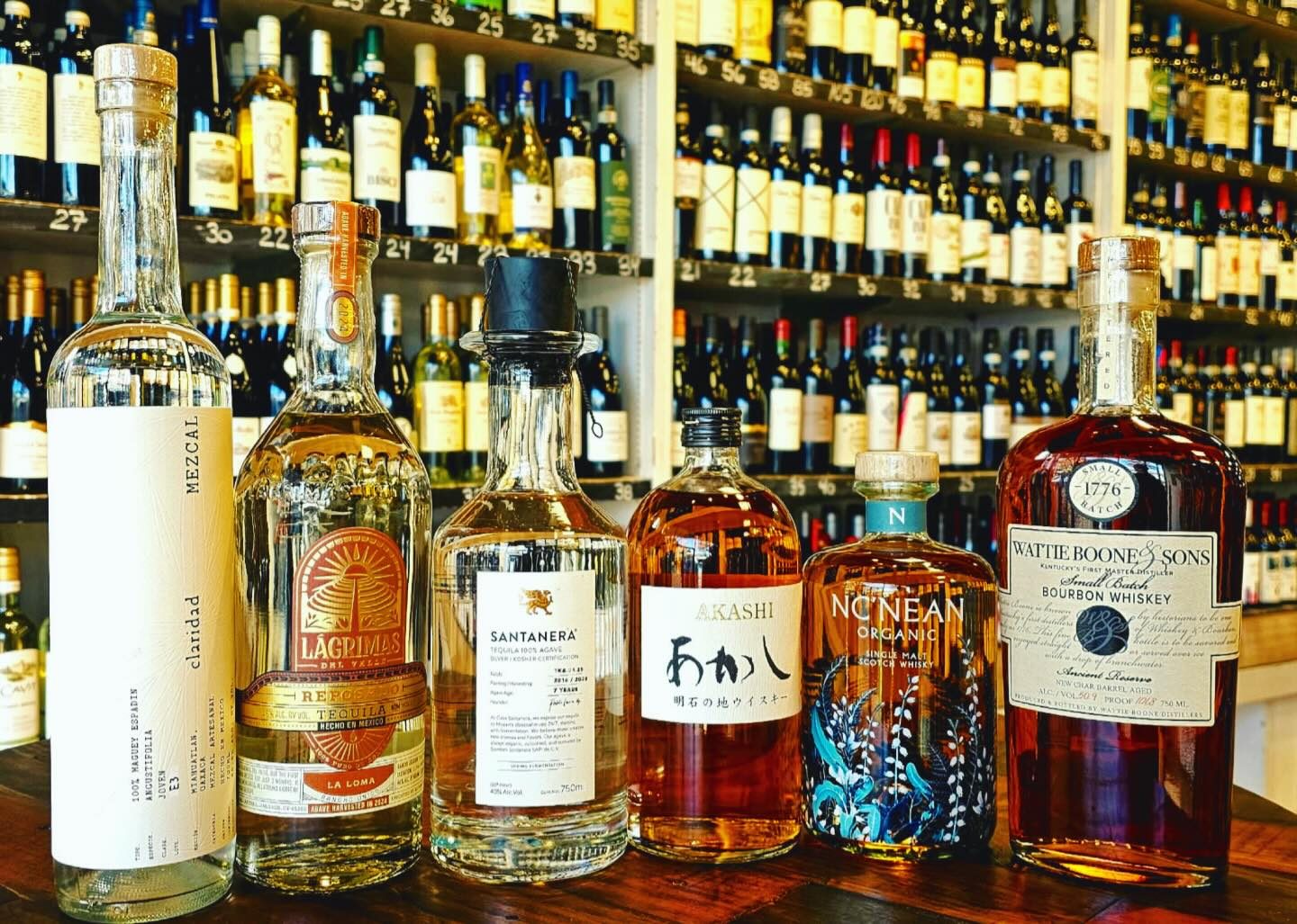 Mezcal, tequila and whisky bottles on the spirits shelf